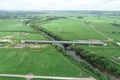 7 DJI_0008_鶴丘橋上部工事 阿寒川下流より望む.JPG